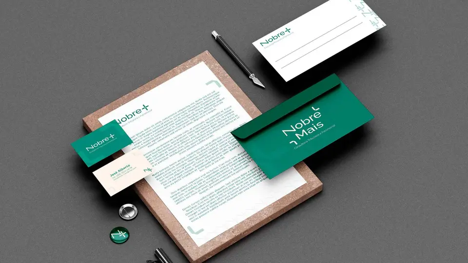 Papelaria da Nobre Mais em verde e branco: papel timbrado, envelope e cartões.